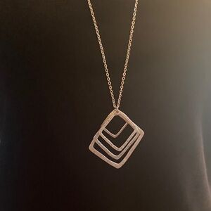 Elegant Silver Geometric Pendant Necklace